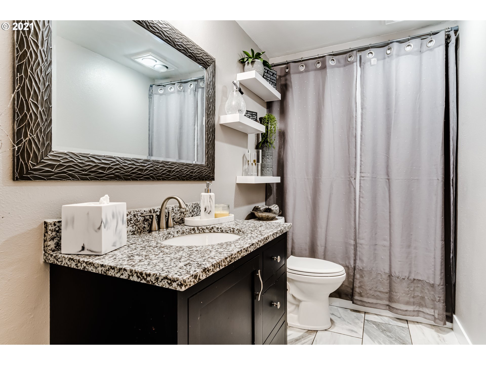 32945 Dillard Road Eugene, OR 97405 - Photo 11 of 30 a bathroom with a granite countertop sink and a mirror