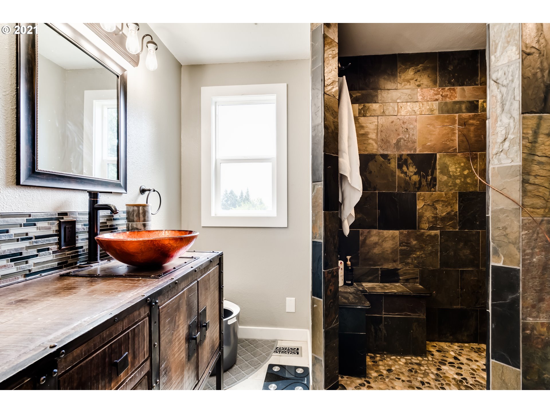 32945 Dillard Road Eugene, OR 97405 - Photo 18 of 30 a bathroom with a sink a toilet and shower