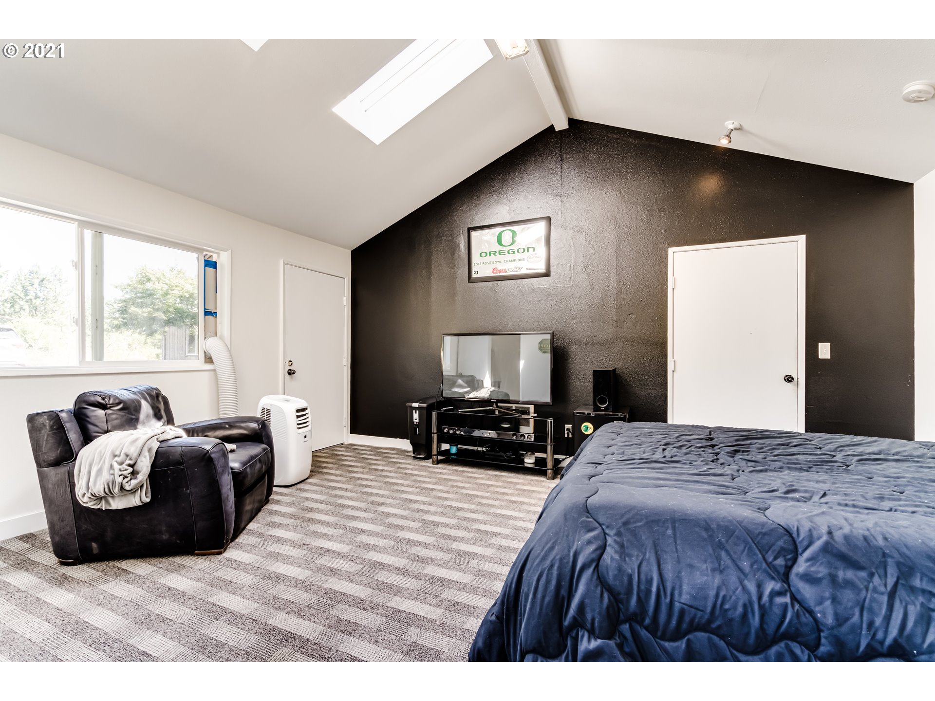 32945 Dillard Road Eugene, OR 97405 - Photo 28 of 30 a bedroom with a bed a couch and dresser