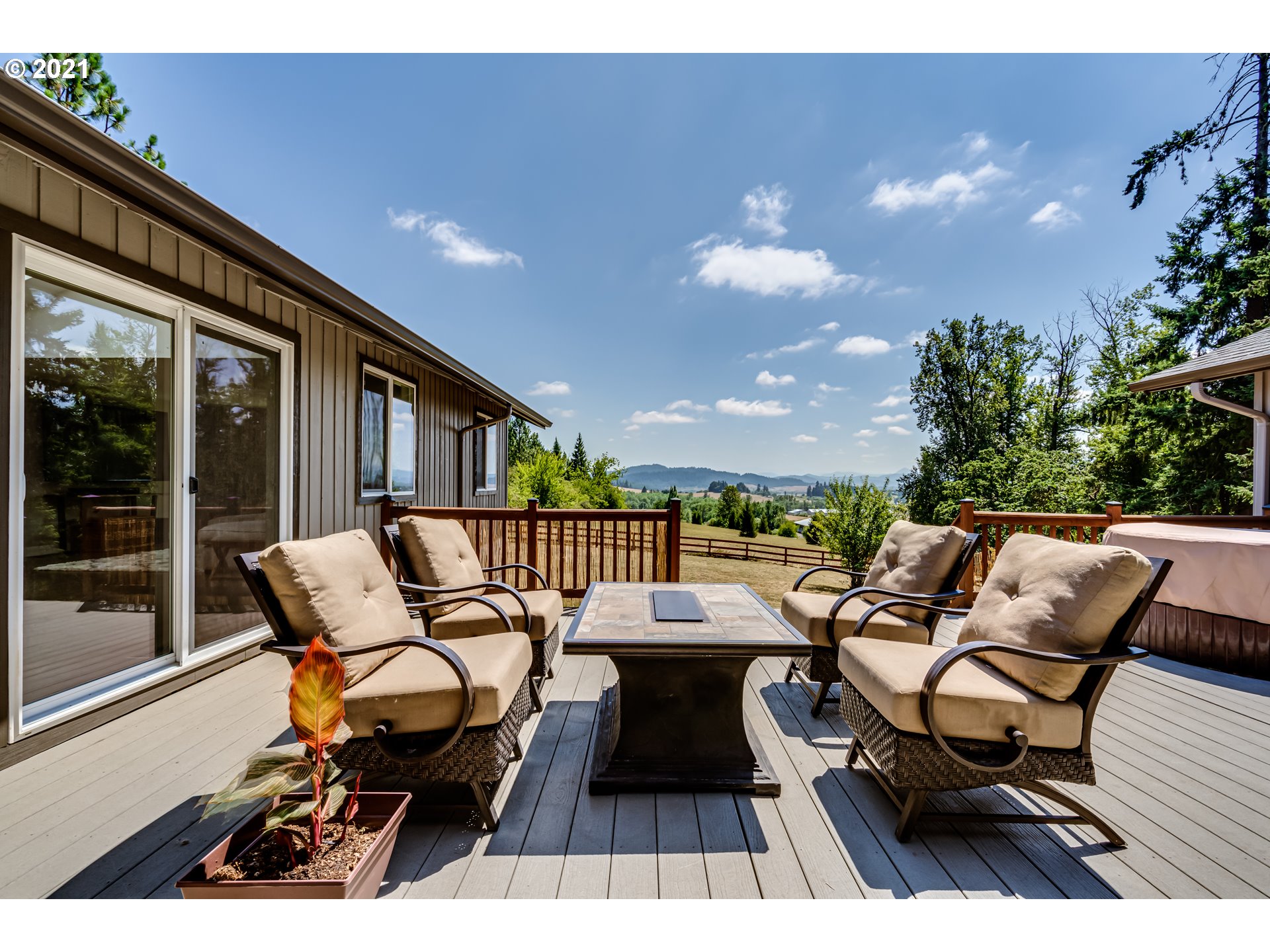 32945 Dillard Road Eugene, OR 97405 - Photo 30 of 30 a balcony with wooden floor outdoor seating and city view