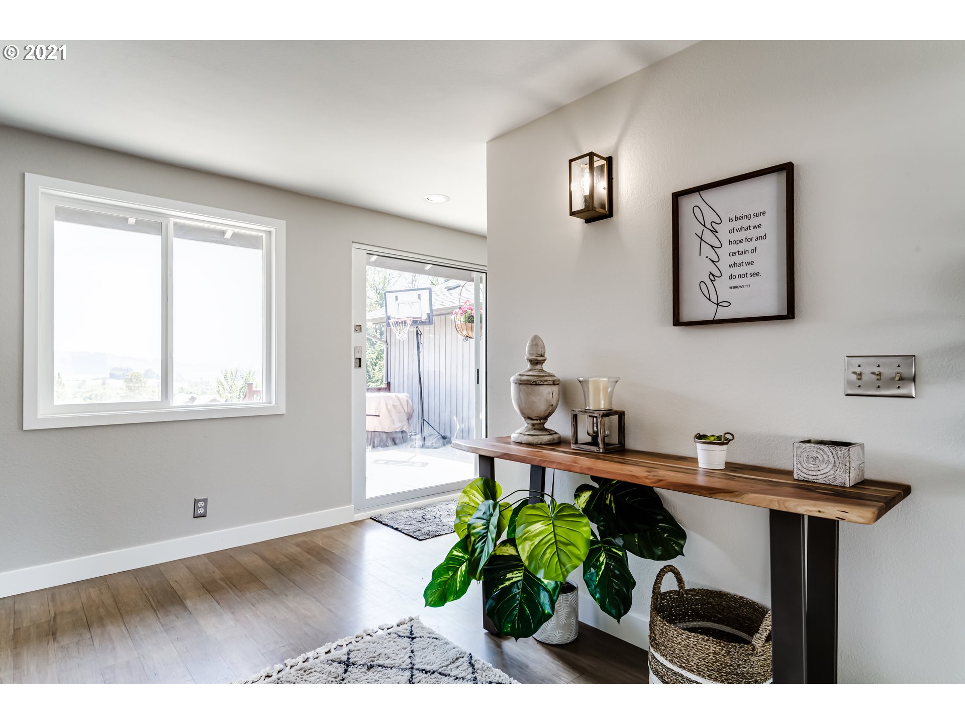 32945 Dillard Road Eugene, OR 97405 - Photo 5 of 30 a view of a workspace with furniture and a potted plant