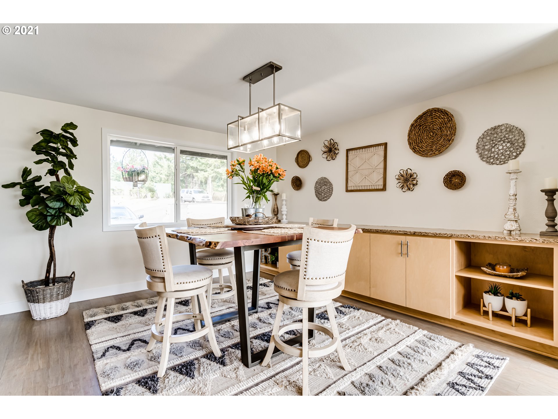 32945 Dillard Road Eugene, OR 97405 - Photo 6 of 30 a view of a dining room with furniture and chandelier