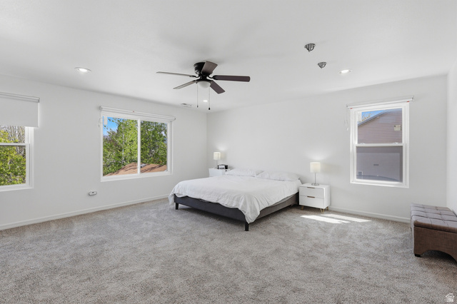 1652 West 800 South Lehi, UT 84043 - Photo 11 of 27 Carpeted bedroom featuring ceiling fan, multiple windows, and recessed lighting