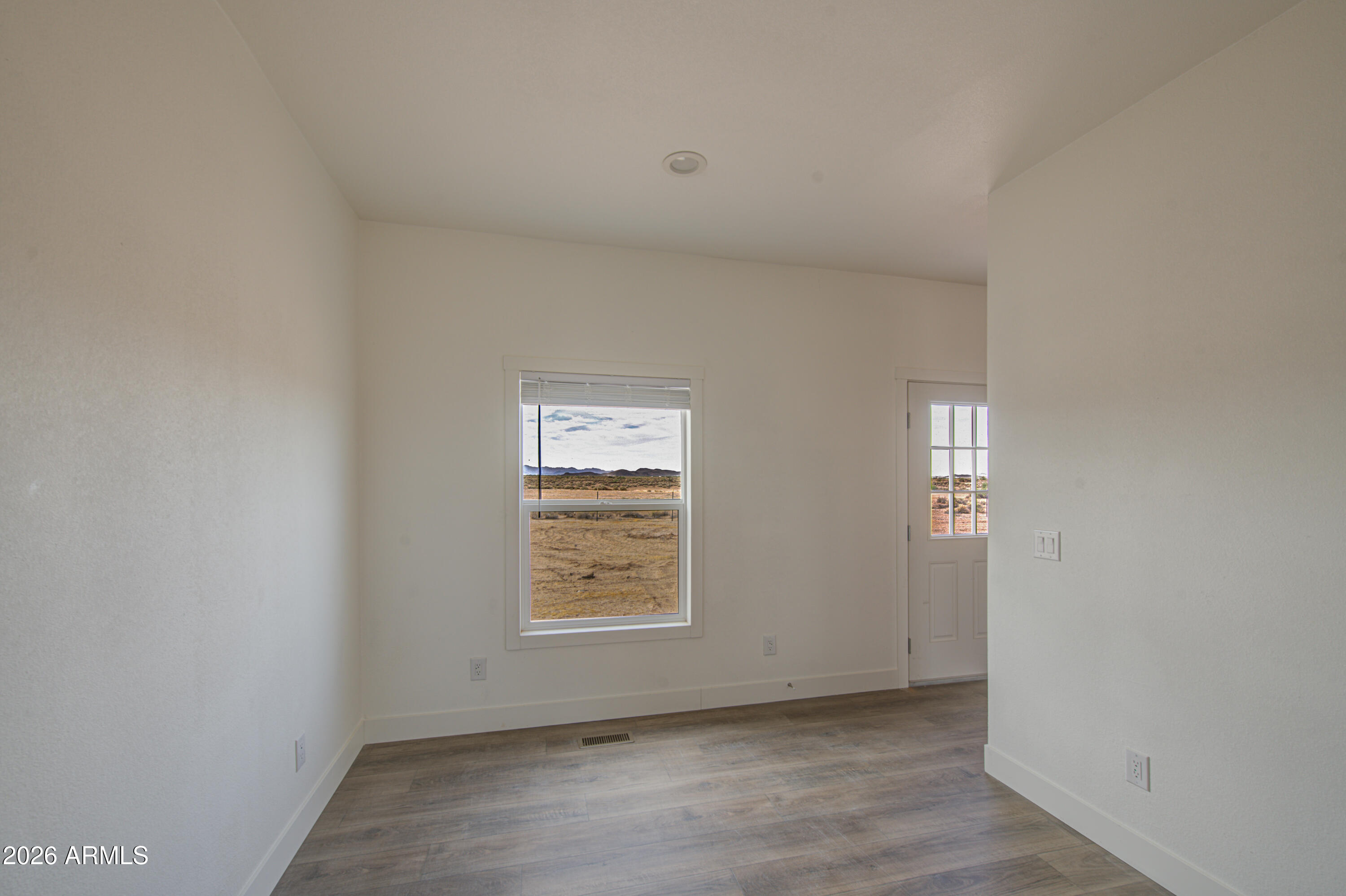 39120 West Maldonado Road Tonopah, AZ 85354 - Photo 11 of 37 an empty room with windows