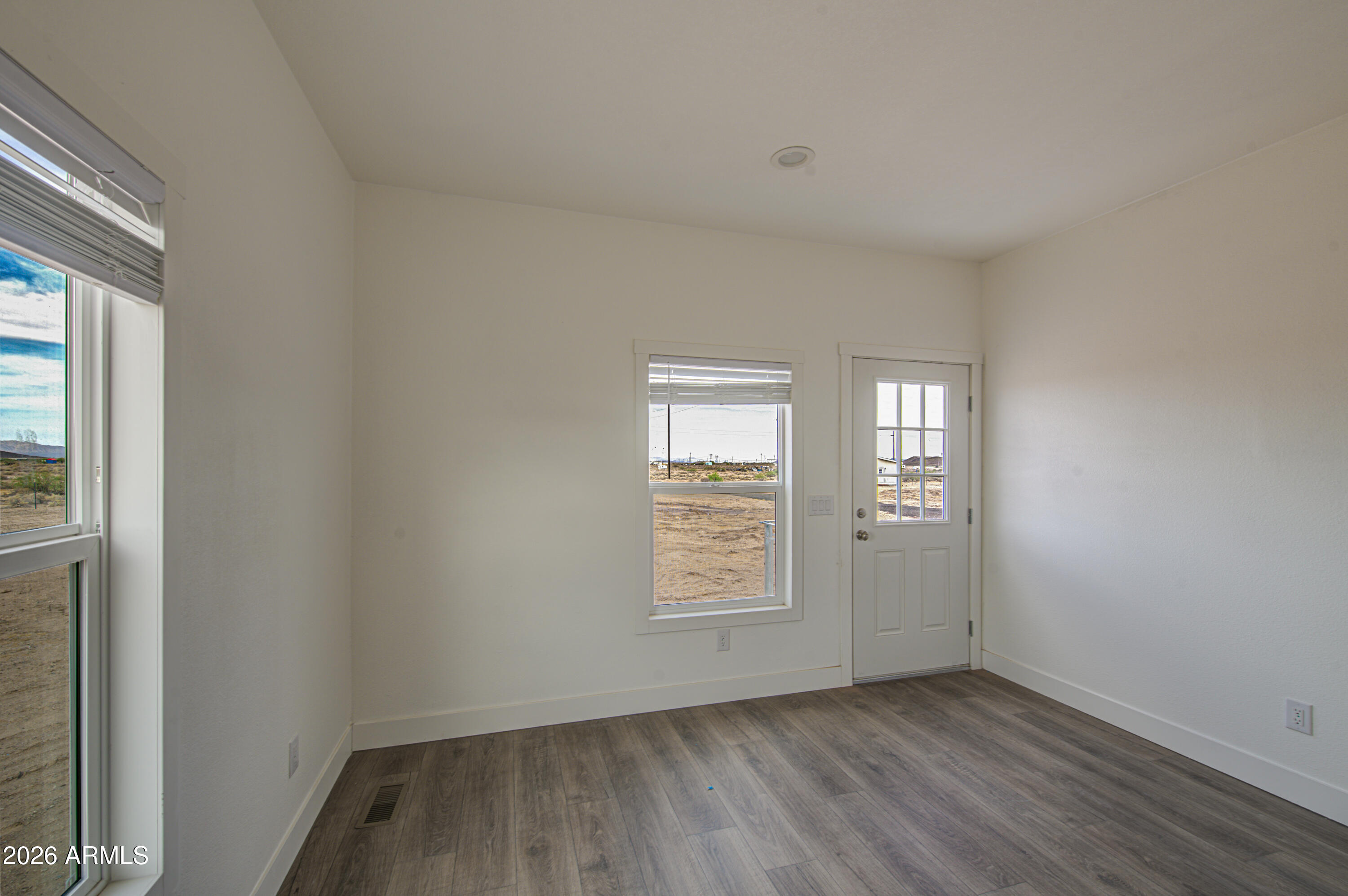 39120 West Maldonado Road Tonopah, AZ 85354 - Photo 19 of 37 an empty room with windows