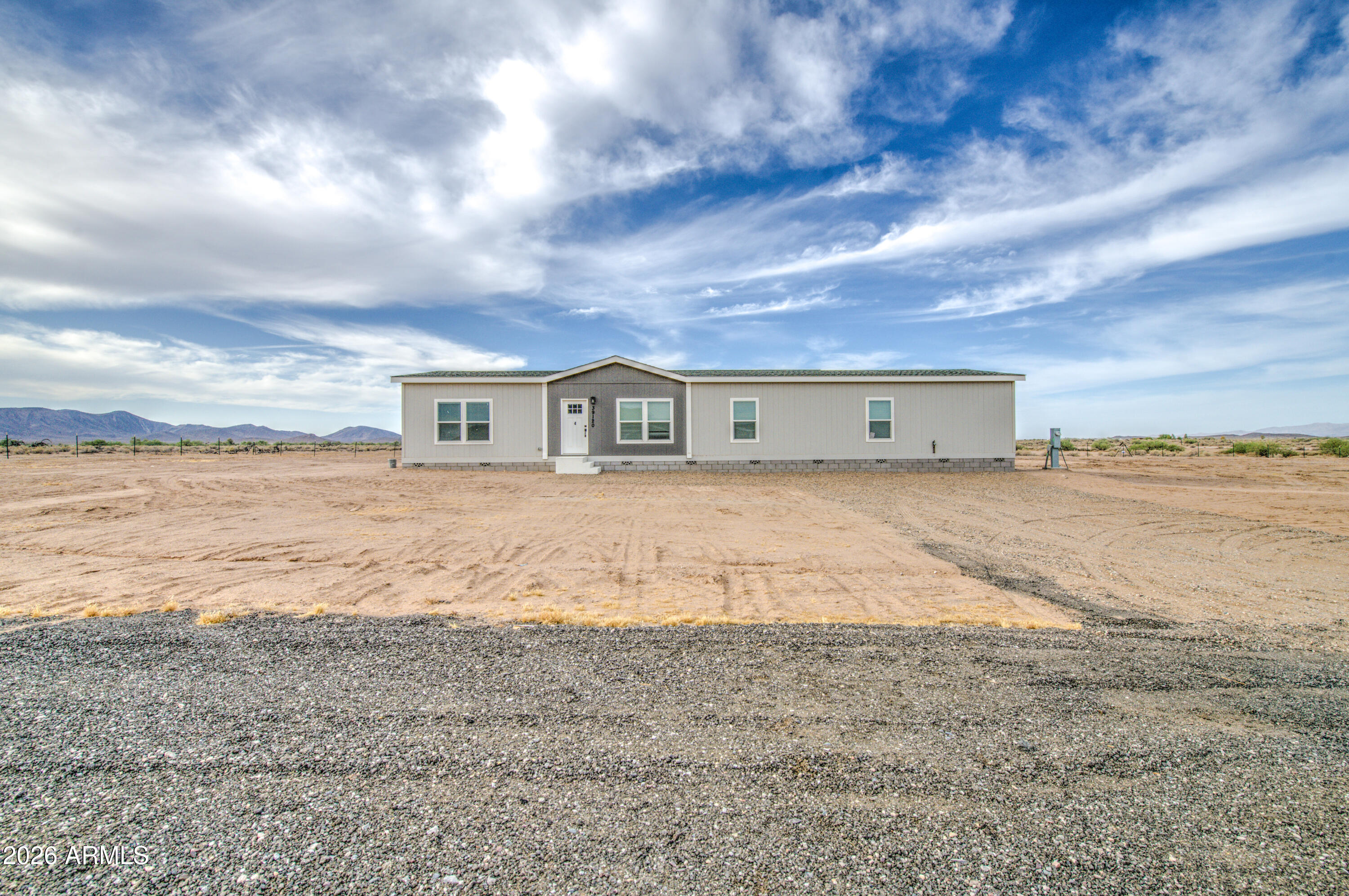 39120 West Maldonado Road Tonopah, AZ 85354 - Photo 2 of 37 a view of house with beach and ocean