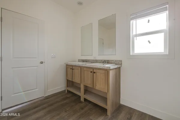 a view of utility room with closet