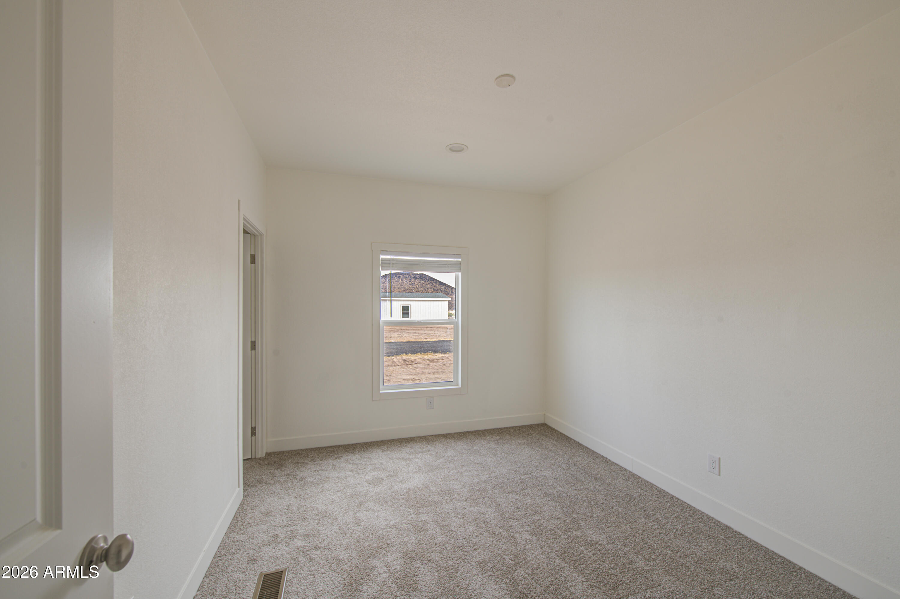 39120 West Maldonado Road Tonopah, AZ 85354 - Photo 27 of 37 an empty room with a window