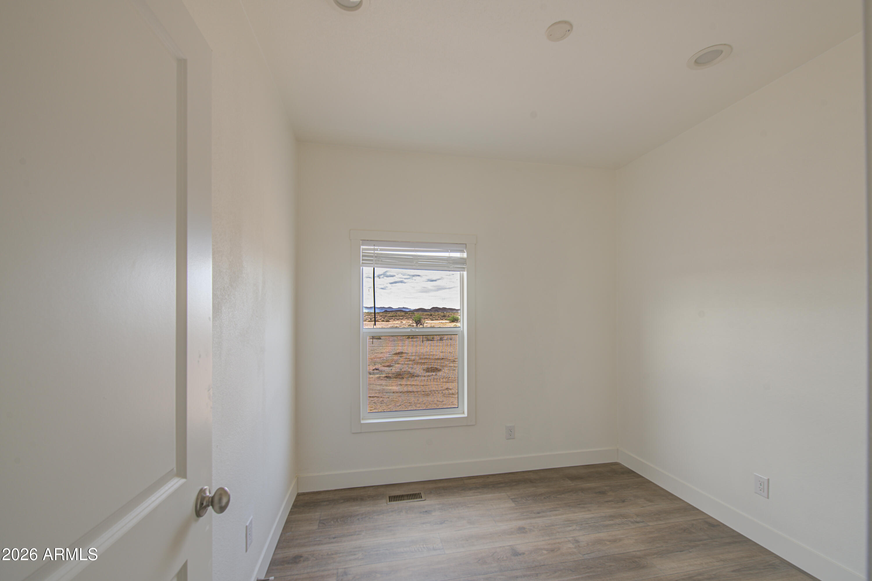 39120 West Maldonado Road Tonopah, AZ 85354 - Photo 28 of 37 an empty room with a window