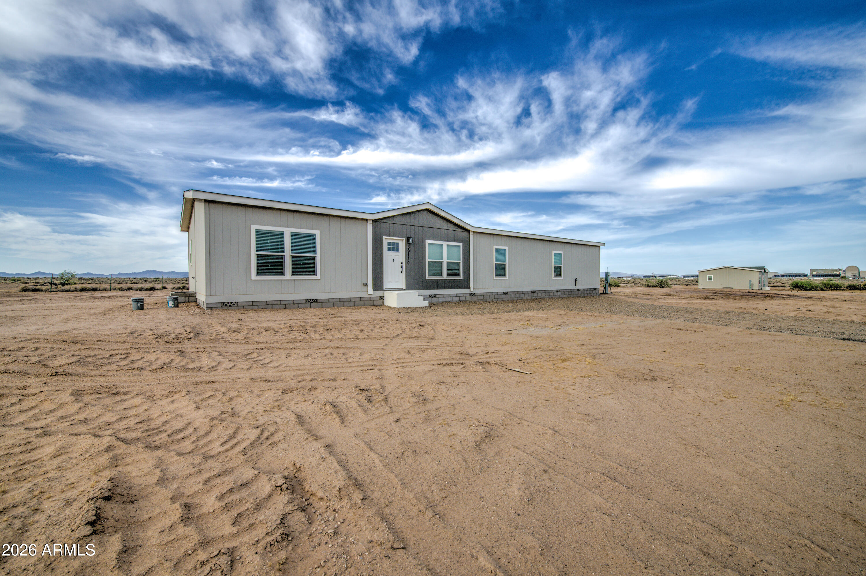 39120 West Maldonado Road Tonopah, AZ 85354 - Photo 3 of 37 a view of a house with a yard