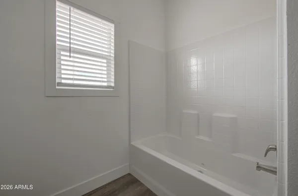 a close up of a bathtub in a bathroom