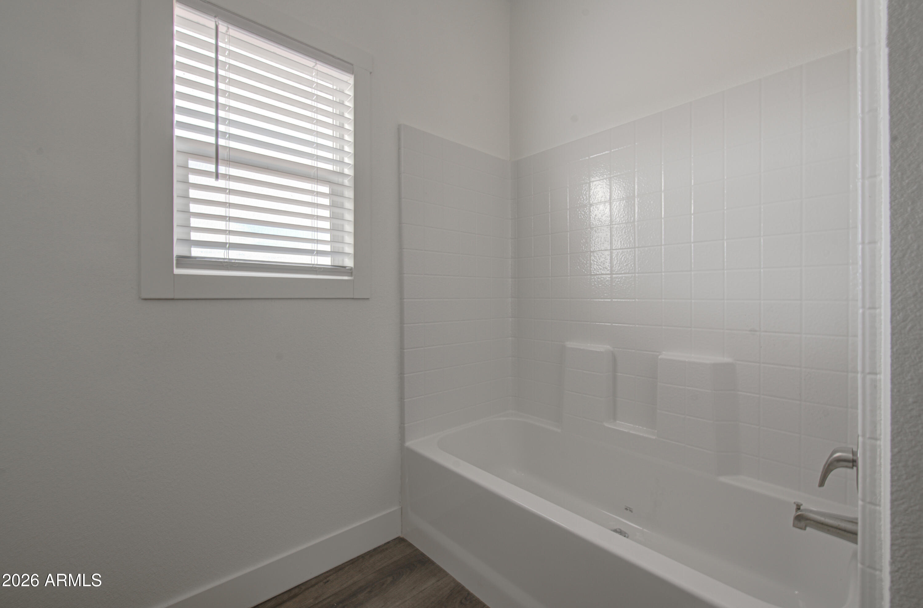 39120 West Maldonado Road Tonopah, AZ 85354 - Photo 32 of 37 a close up of a bathtub in a bathroom