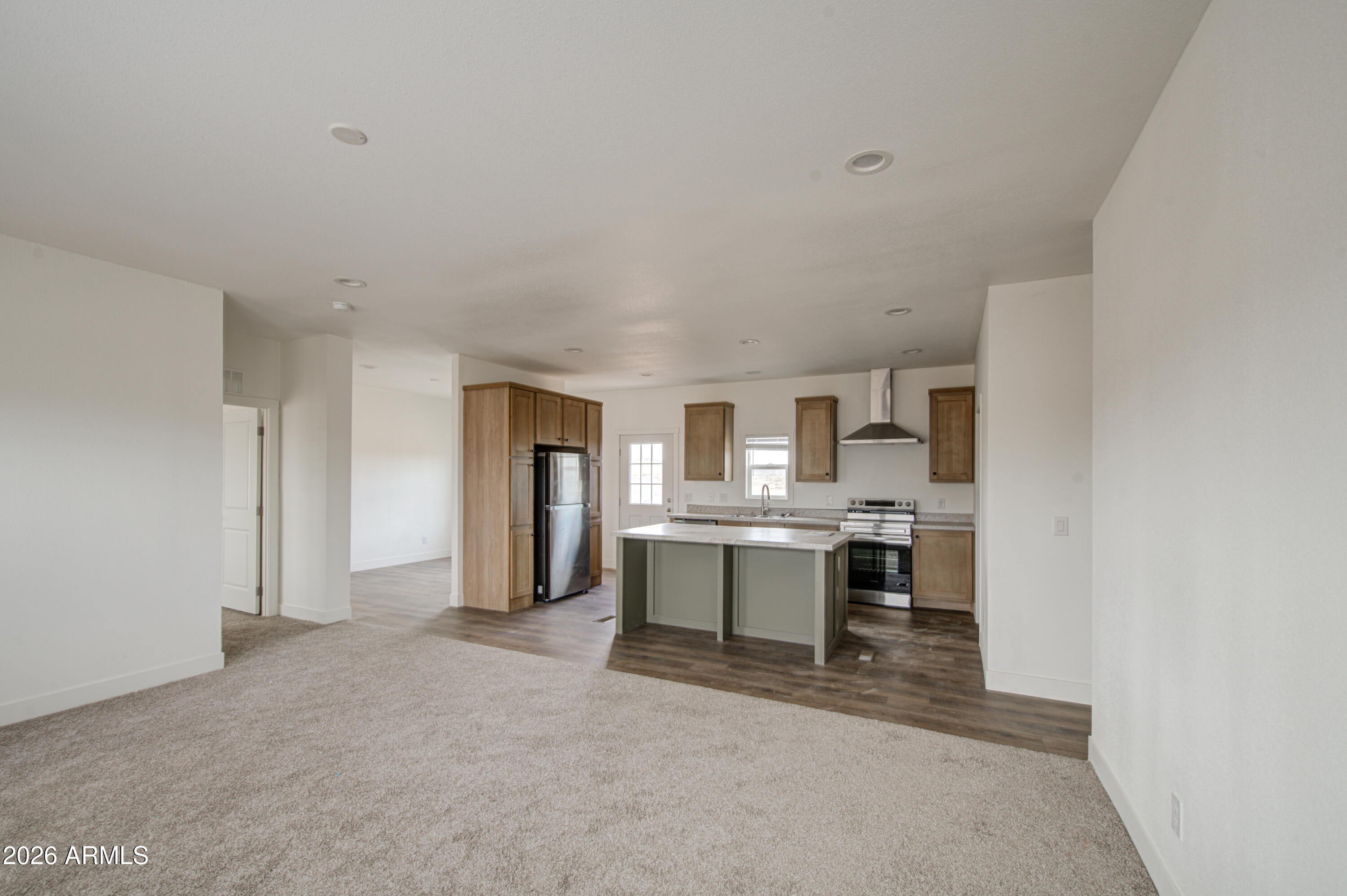 39120 West Maldonado Road Tonopah, AZ 85354 - Photo 7 of 37 a view of kitchen with refrigerator stove and oven