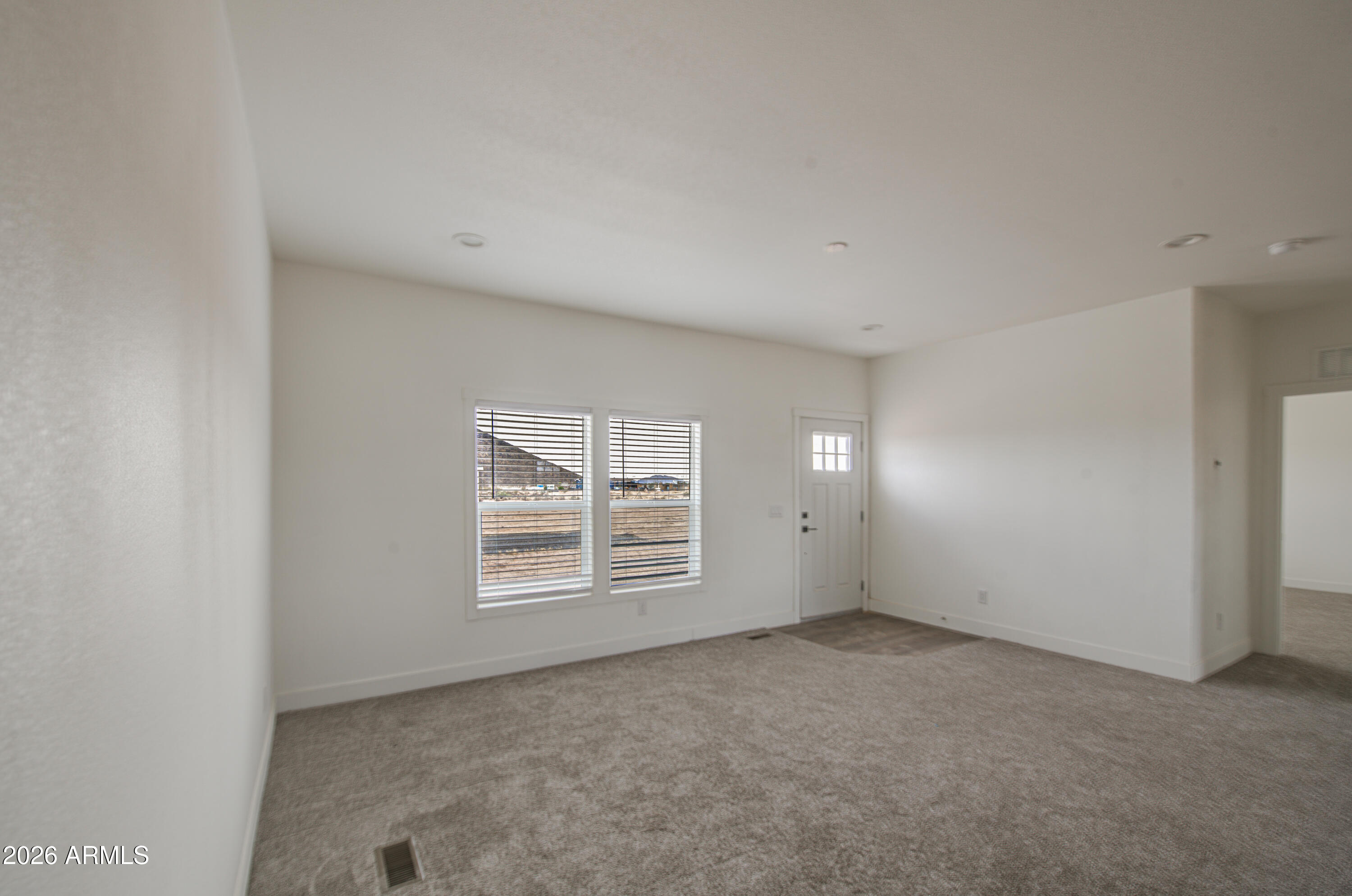39120 West Maldonado Road Tonopah, AZ 85354 - Photo 8 of 37 an empty room with windows