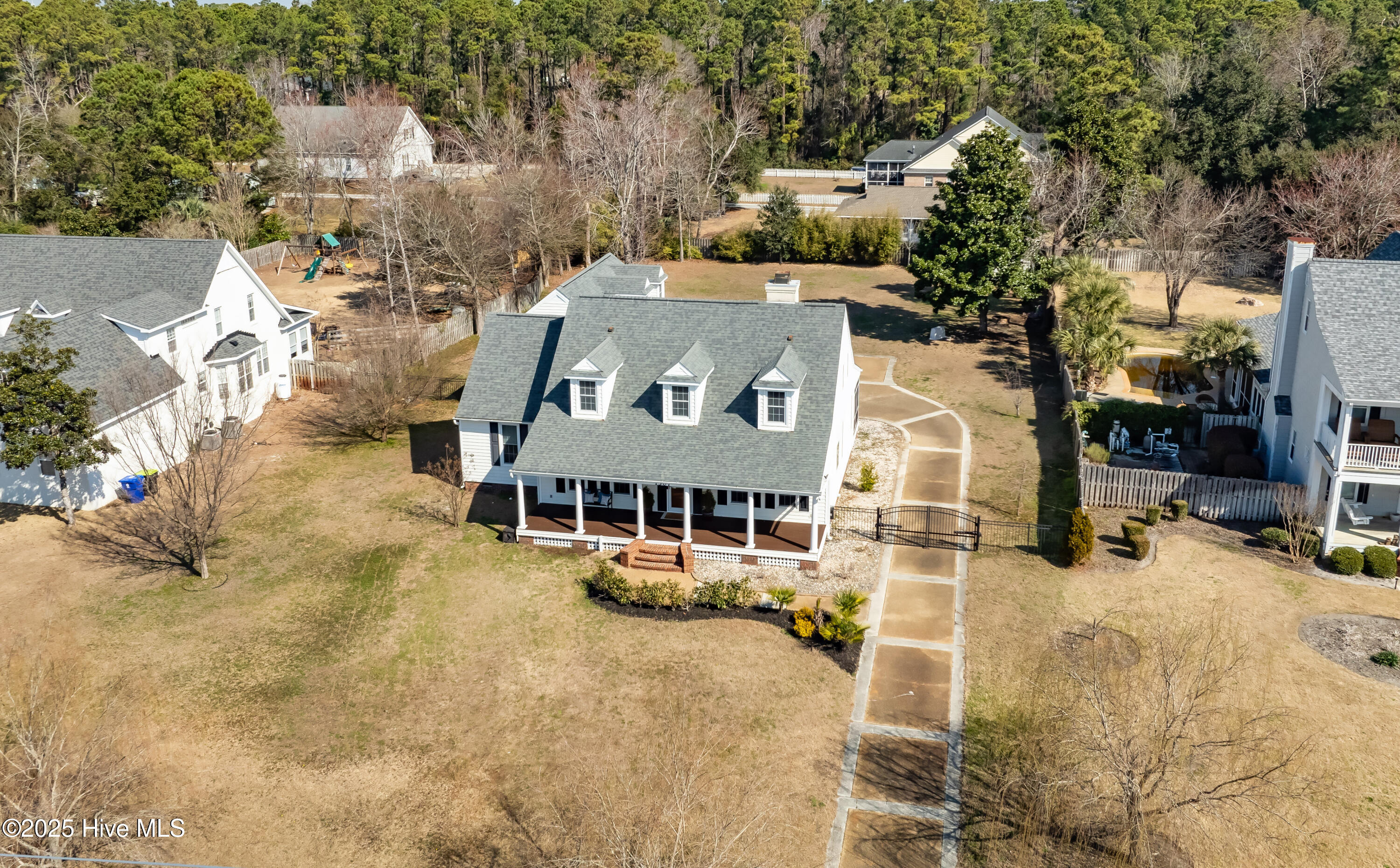 1307 Edgewater Club Road Wilmington, NC 28411 - Photo 39 of 55 Setback from road provides a peaceful, quiet setting.
