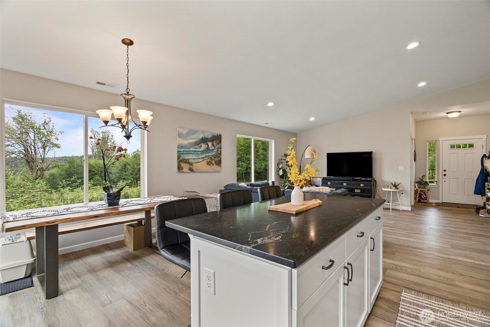 144-38 18 Loop Road Centralia, WA 98531 - Photo 14 of 39 a living room with furniture a flat screen tv and a large window