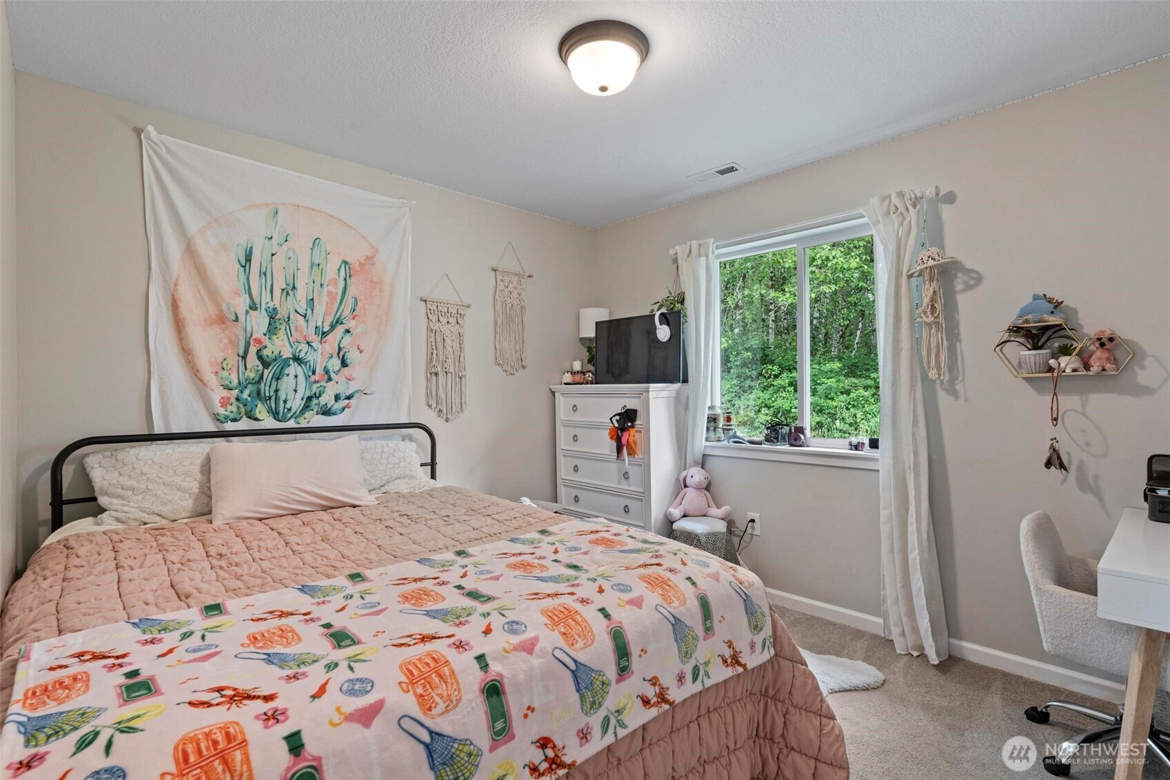 144-38 18 Loop Road Centralia, WA 98531 - Photo 18 of 39 a bedroom with a large bed and a window