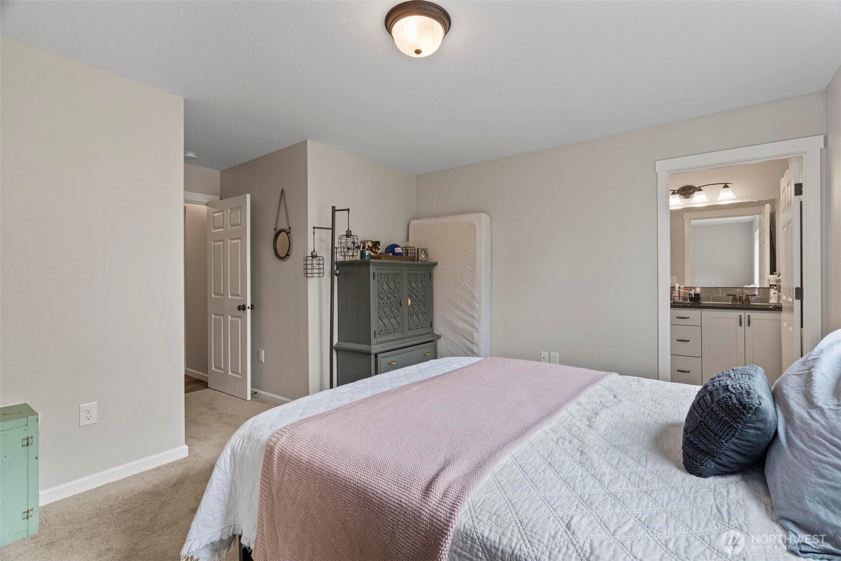 144-38 18 Loop Road Centralia, WA 98531 - Photo 23 of 39 a bedroom with a bed and a lamp