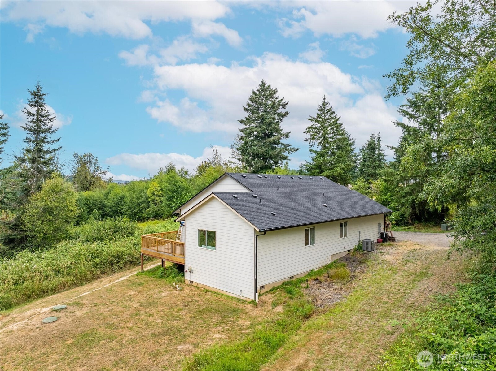 144-38 18 Loop Road Centralia, WA 98531 - Photo 26 of 39 a view of a house with a yard and large tree
