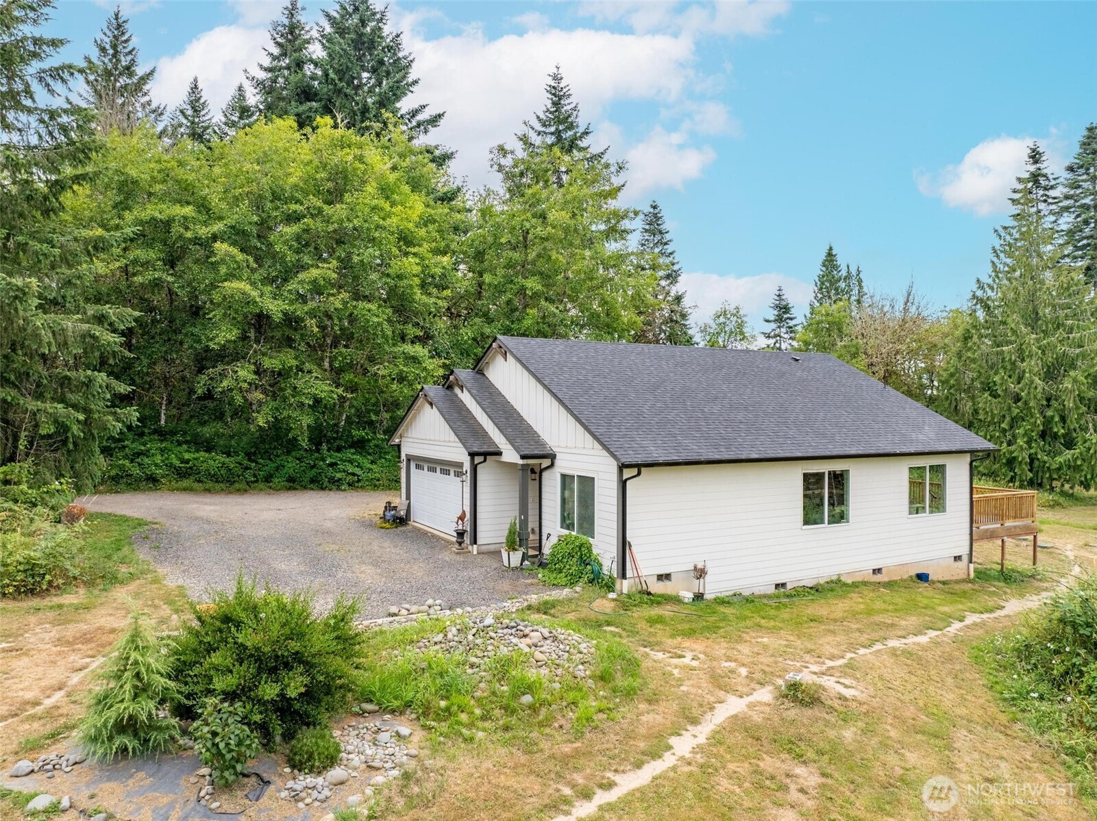 144-38 18 Loop Road Centralia, WA 98531 - Photo 30 of 39 a house with trees in the background