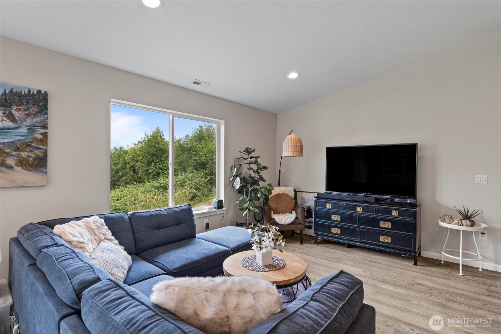 144-38 18 Loop Road Centralia, WA 98531 - Photo 6 of 39 a living room with furniture and a flat screen tv