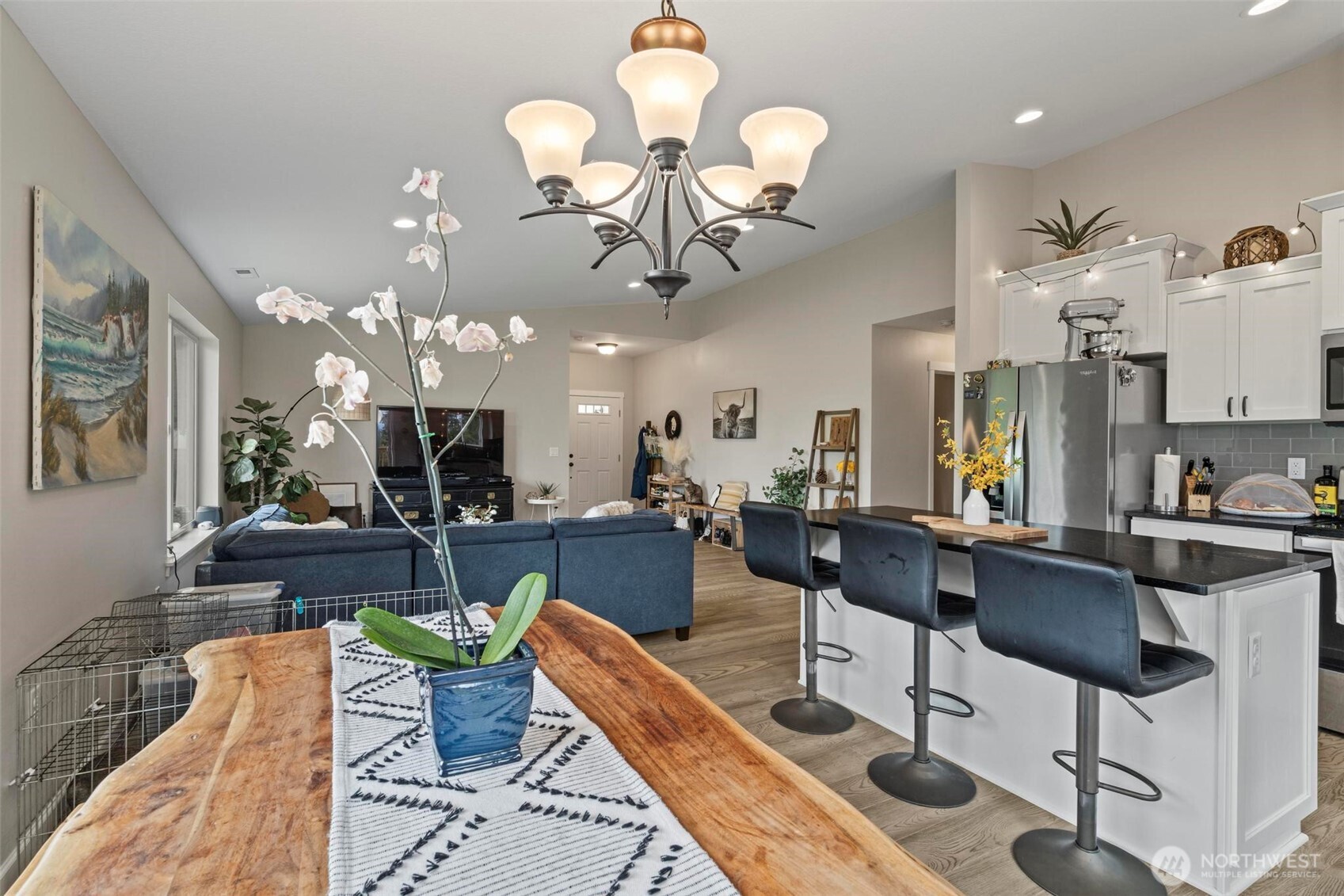 144-38 18 Loop Road Centralia, WA 98531 - Photo 10 of 39 a living room with lots of furniture and a chandelier