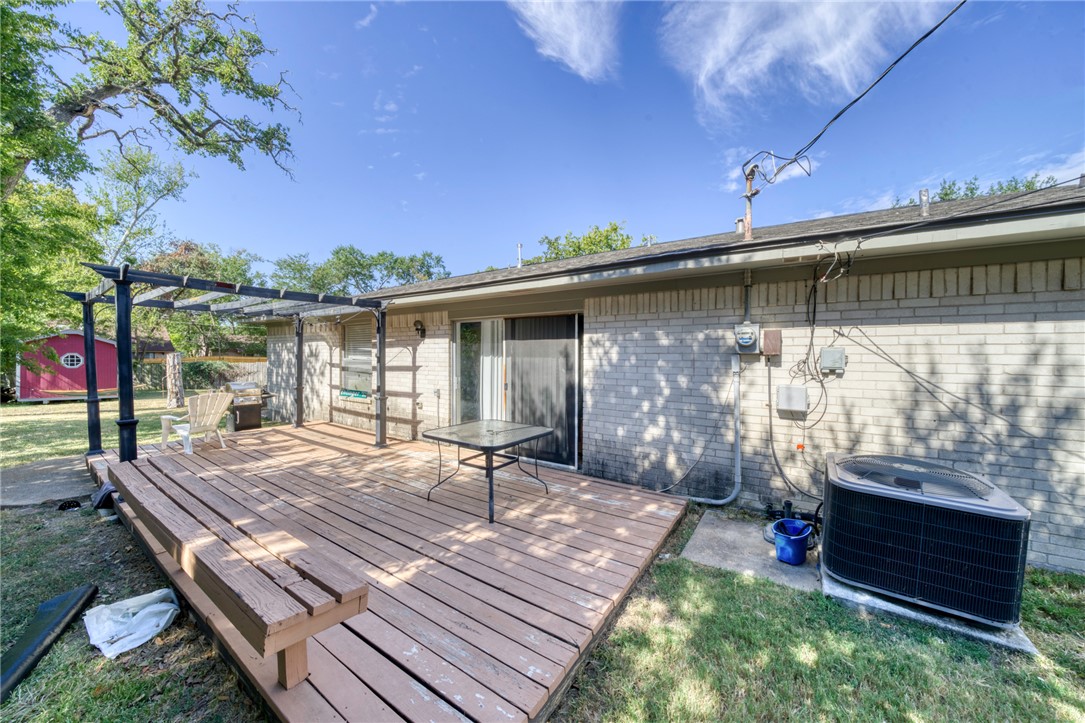 1410 Clement Court College Station, TX 77840 - Photo 13 of 16 a view of a backyard with sitting area