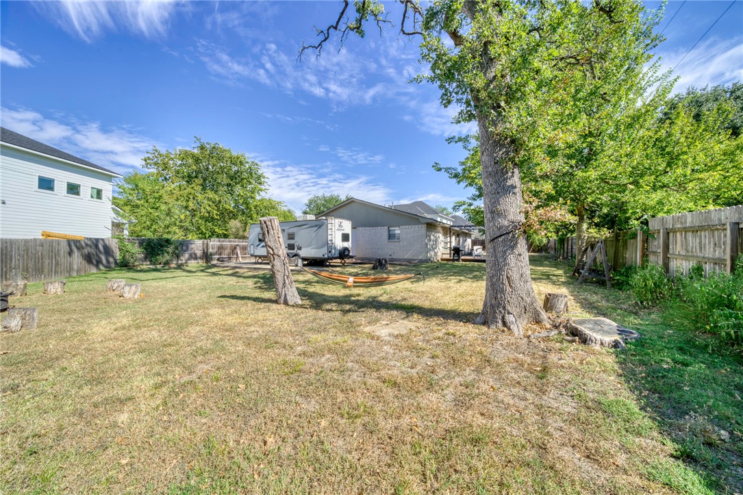1410 Clement Court College Station, TX 77840 - Photo 16 of 16 a view of yard with tree in front of it