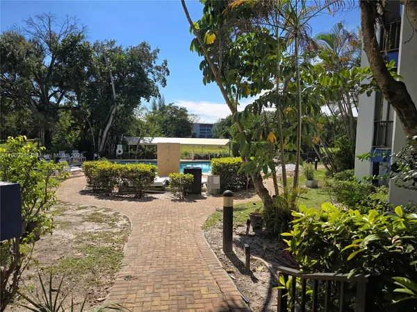 a view of a garden with patio