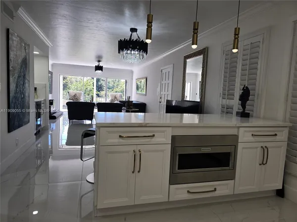 a view of kitchen and utility room