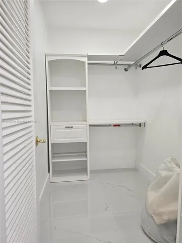 a view of a kitchen and dining room