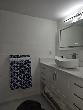 a view of a lake with a yard