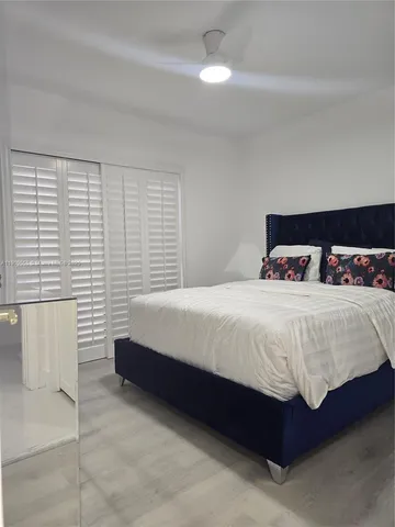 a view of a garden area with potted plants