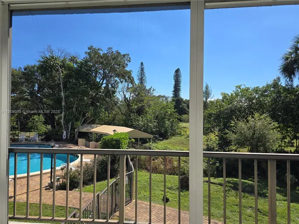 a view of a garden area with potted plants