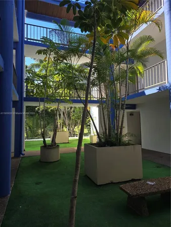 a plant that is in front of a house