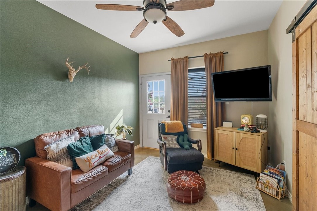 226 Private Road Alice, TX 78332 - Photo 20 of 40 a living room with furniture and a flat screen tv