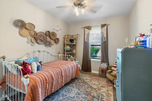 a bedroom with a bed and furniture