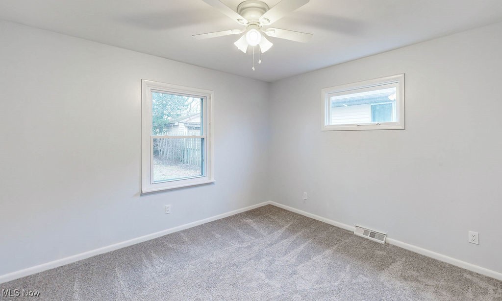 622 Stanley Road Akron, OH 44312 - Photo 25 of 33 Bedroom with ceiling fan and carpet floors