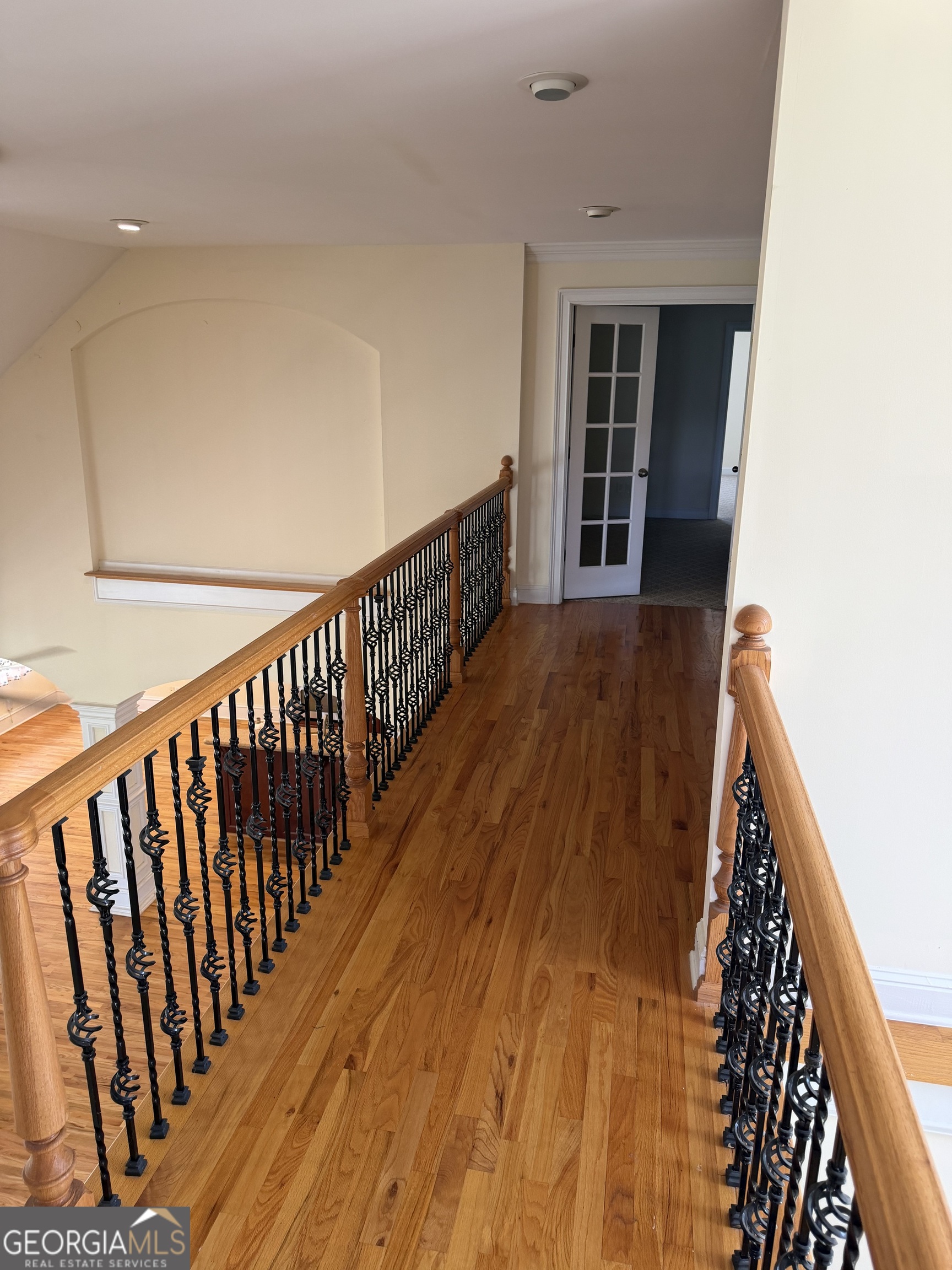 302 Norris Road Barnesville, GA 30204 - Photo 50 of 65 a view of a hallway with wooden floor and stairs
