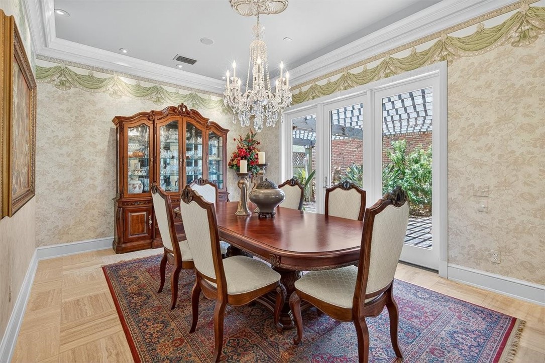 4811 Ocean Drive Corpus Christi, TX 78412 - Photo 12 of 39 a view of a dining room with furniture window and chandelier