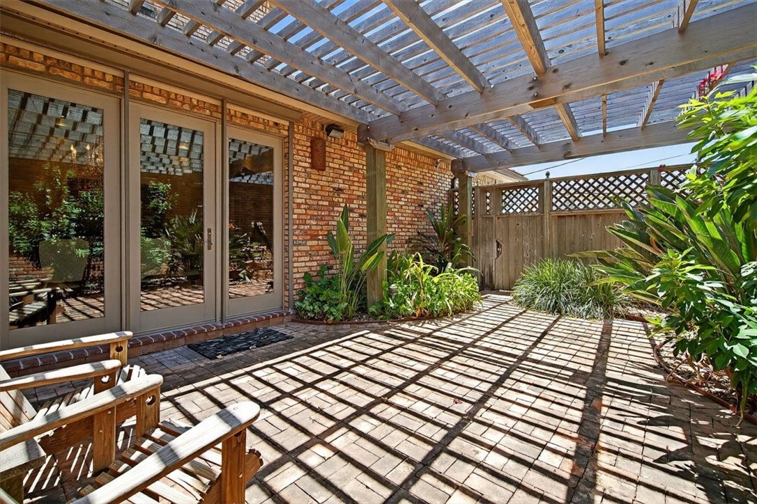 4811 Ocean Drive Corpus Christi, TX 78412 - Photo 15 of 39 a view of backyard with potted plants