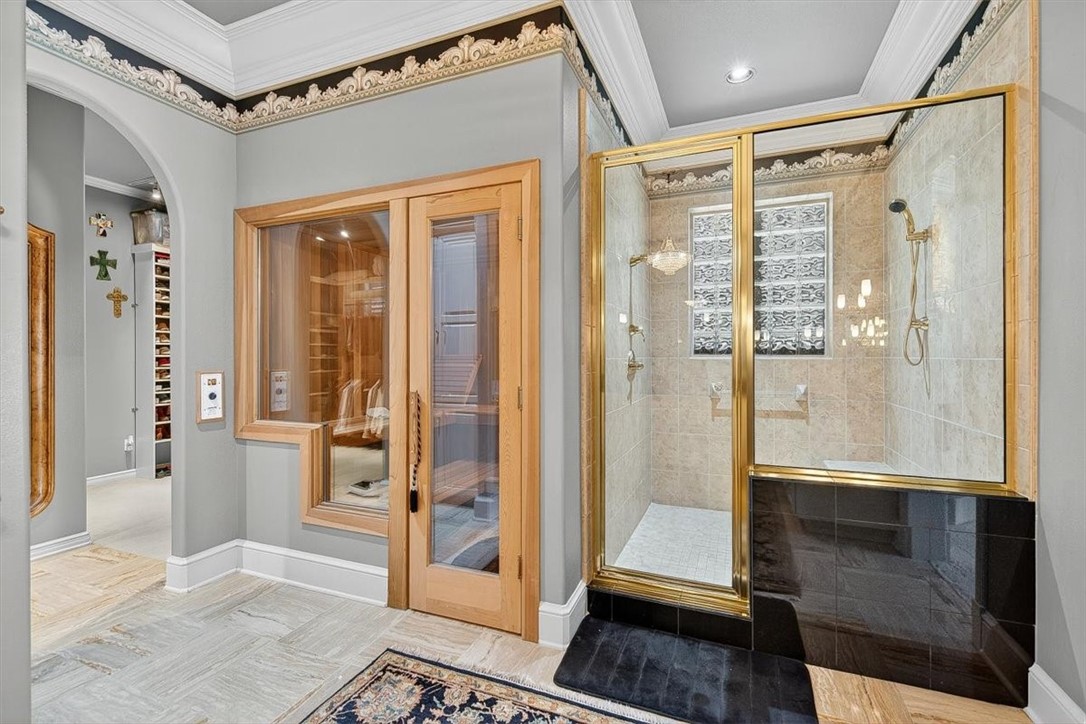 4811 Ocean Drive Corpus Christi, TX 78412 - Photo 18 of 39 a bathroom with a glass shower door