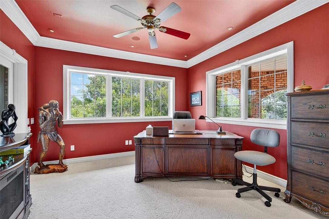 4811 Ocean Drive Corpus Christi, TX 78412 - Photo 25 of 39 a view of a workspace with furniture and a window