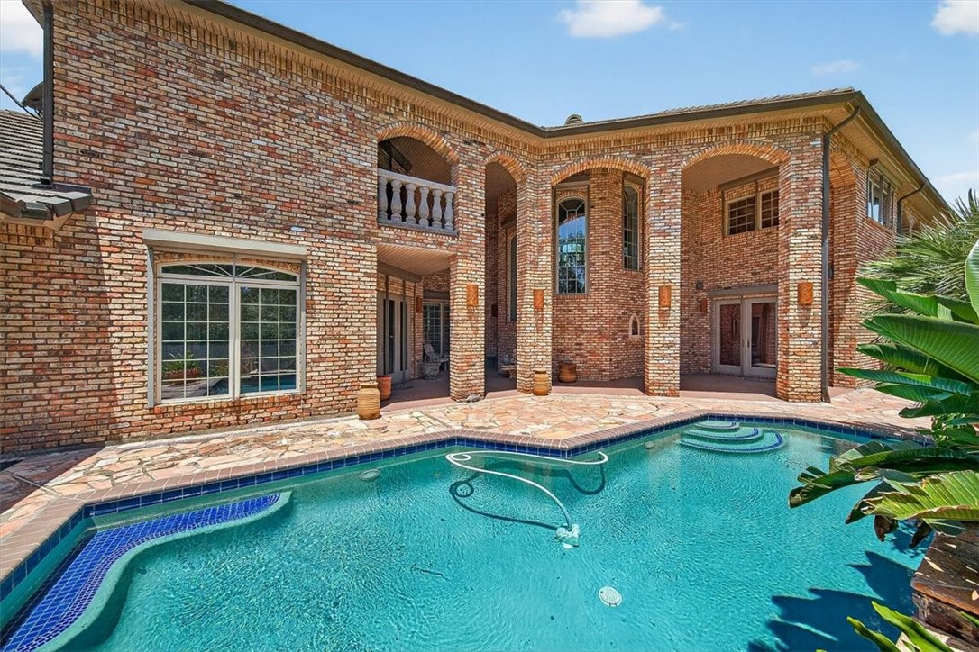 4811 Ocean Drive Corpus Christi, TX 78412 - Photo 3 of 39 a front view of a house with yard