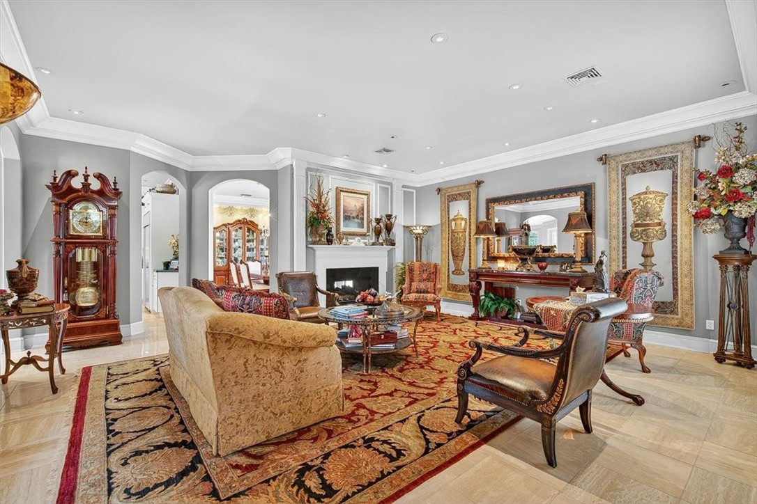 4811 Ocean Drive Corpus Christi, TX 78412 - Photo 7 of 39 a living room with fireplace furniture and a window