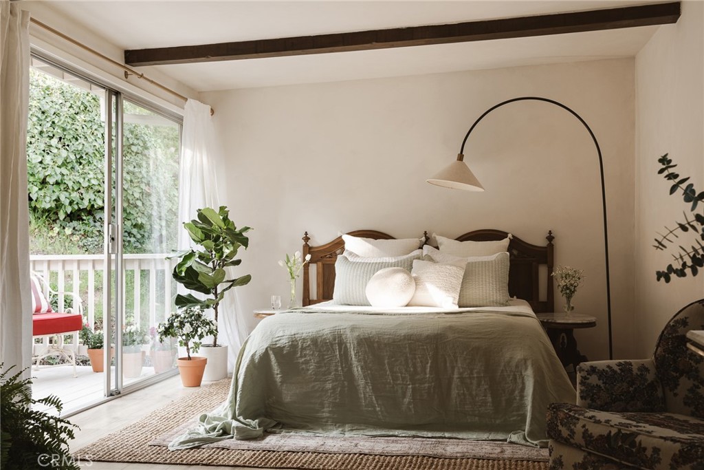 601 Sinclair Avenue Glendale, CA 91206 - Photo 28 of 38 a bed sitting in a bedroom next to a window