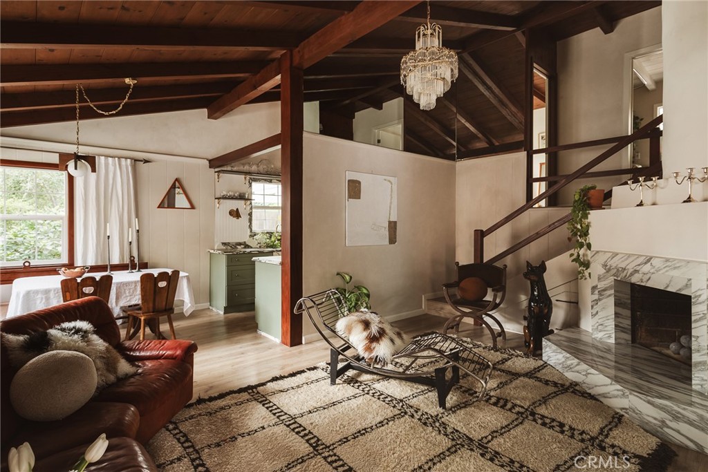 601 Sinclair Avenue Glendale, CA 91206 - Photo 6 of 38 a living room with furniture a fireplace and a table
