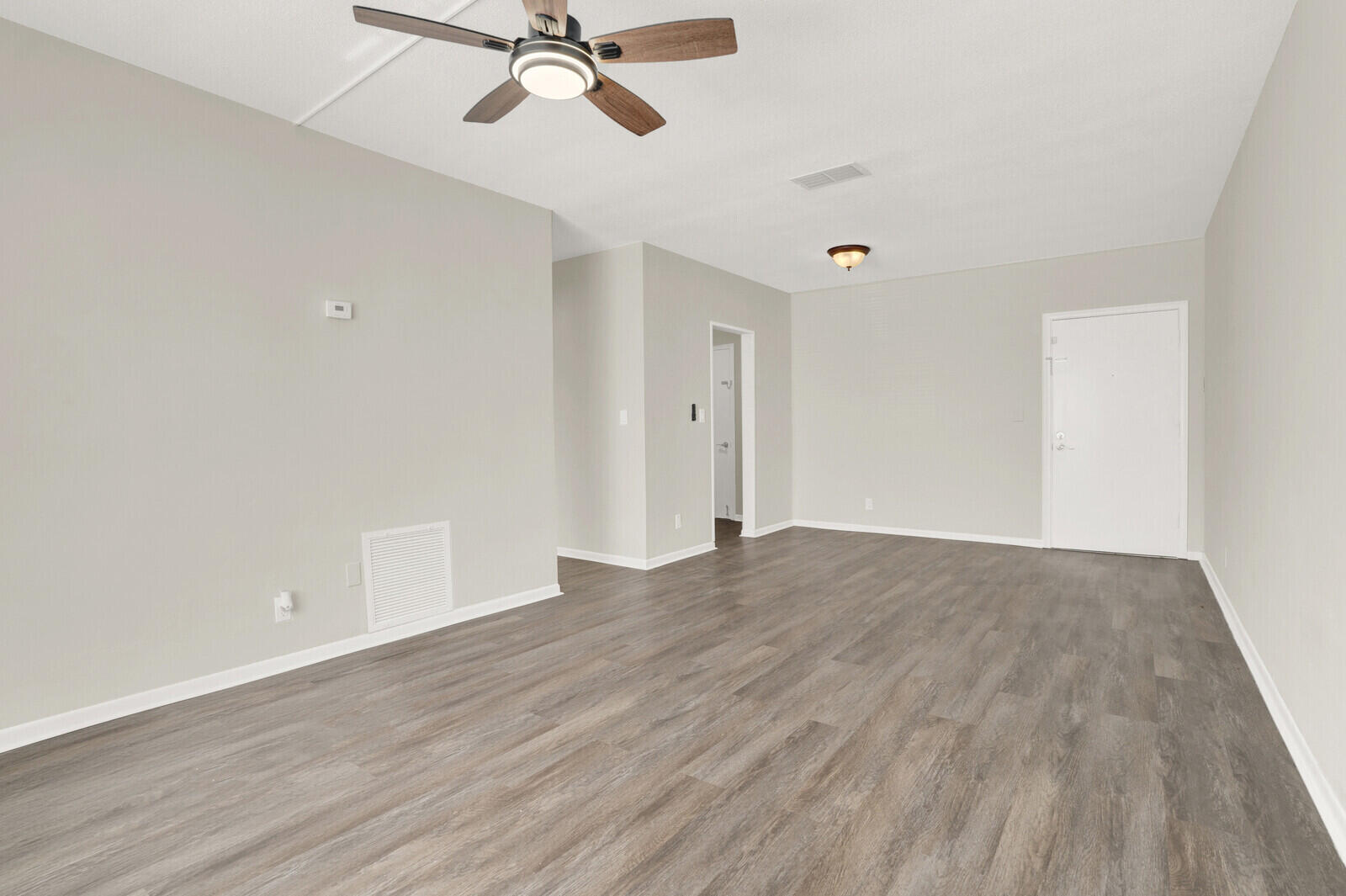 299 Southwest 7th Street, Unit 1040 Boca Raton, FL 33432 - Photo 7 of 31 Living Room/Dining Area