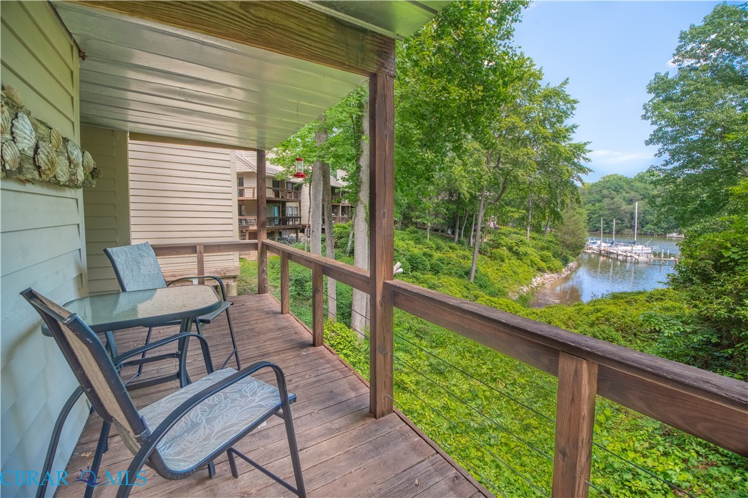 54 Villa Ridge Drive, Unit C Hartfield, VA 23071 - Photo 3 of 45 Deck with a water view