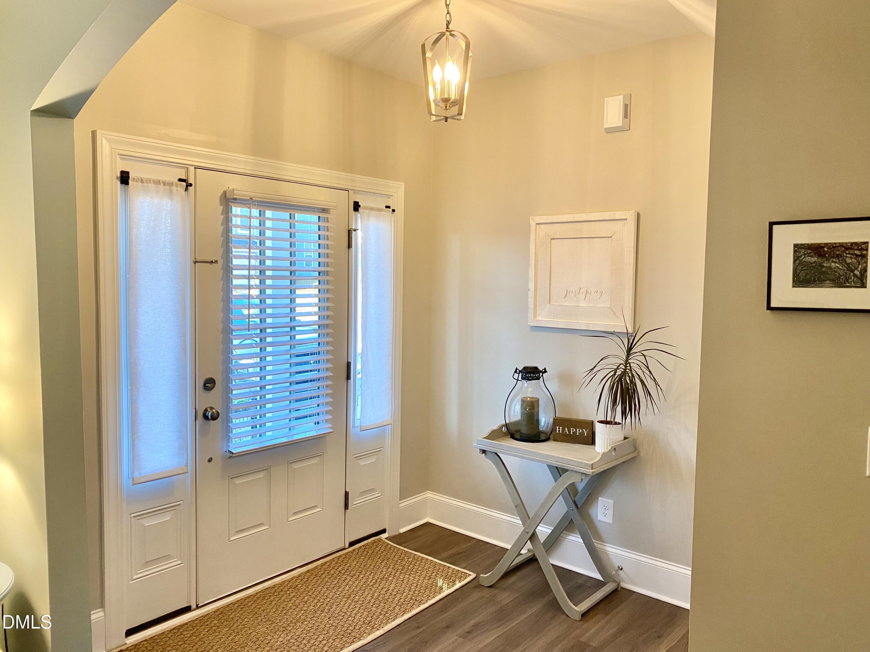 2913 Thurman Dairy Loop Wake Forest, NC 27587 - Photo 5 of 31 a room that has a window and a table in it